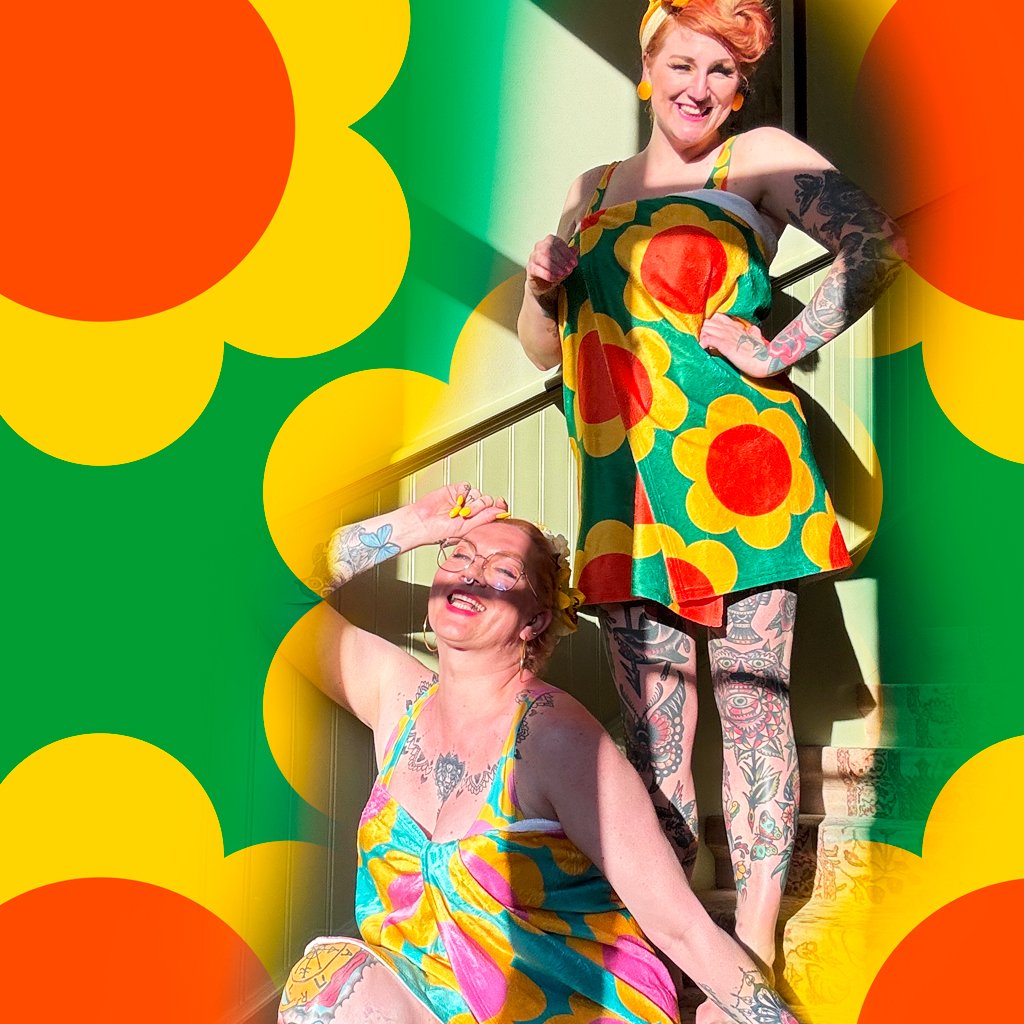 Two joyful women in colorful towels by SHALMIAK.